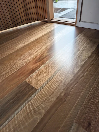 Without the stress of rushing to estimates at the end of the day, Lisa and I can concentrate on delivering top-tier finish jobs, like this spotted gum floor.