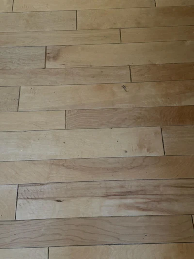 Damaged Beveled Wood Floor Img 2776