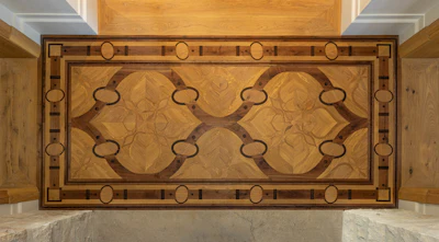 Jason Vivash's design for this hallway accent floor was inspired by an equestrian motif, to which he then added floral inlays.