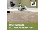 Gym floor refinishing with industrial equipment and workers demonstrating professional facility maintenance