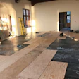 The single-layer plywood subfloor creates less of a height difference and saves money on adhesive.
