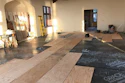 The single-layer plywood subfloor creates less of a height difference and saves money on adhesive.