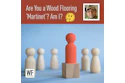 Red wooden peg stands out among white pegs on blue background, representing leadership and uniqueness in business