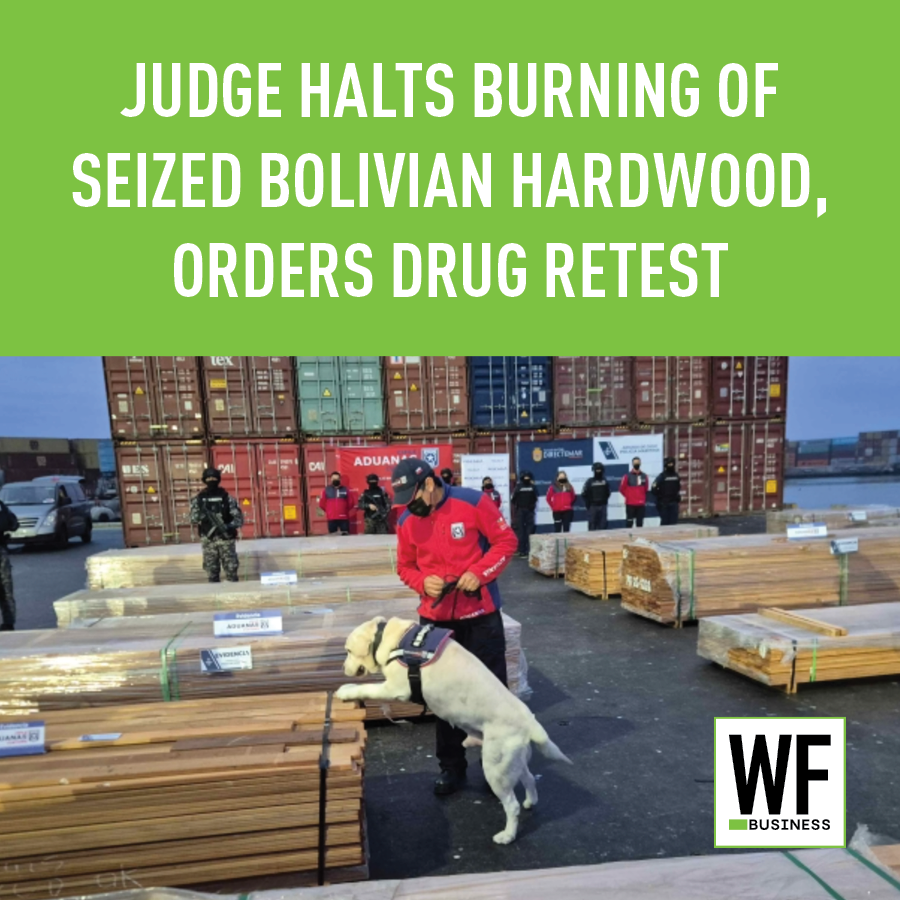 Drug enforcement officials with detection dog inspect seized Bolivian hardwood shipment at port facility