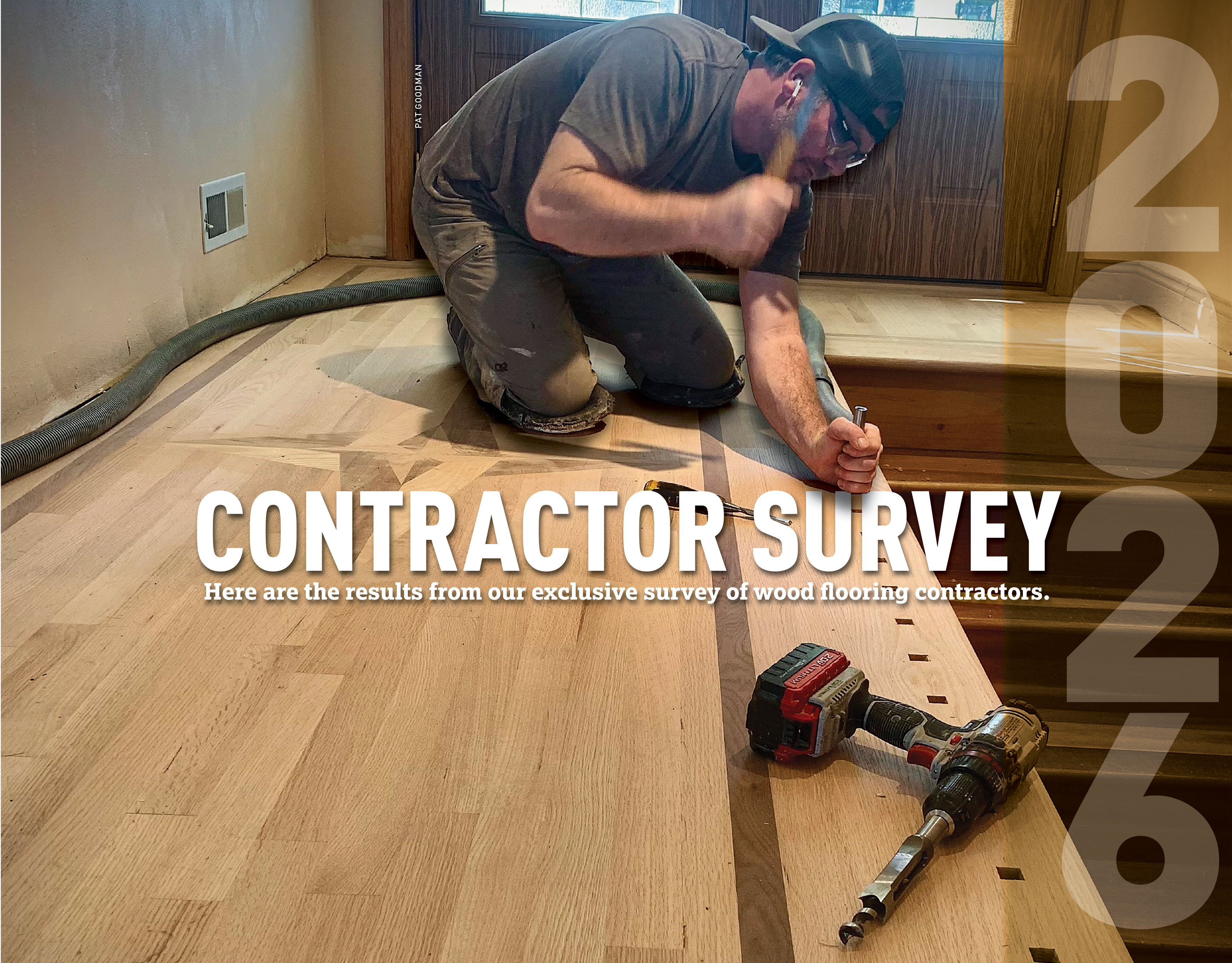 Wood flooring contractor kneeling while installing hardwood flooring with power tools on a residential floor