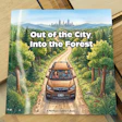 Children's book cover showing a brown SUV driving down a forest road with city skyline visible in the distance